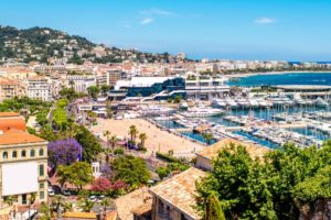 Top cityscape view on french riviera with yachts in Cannes city