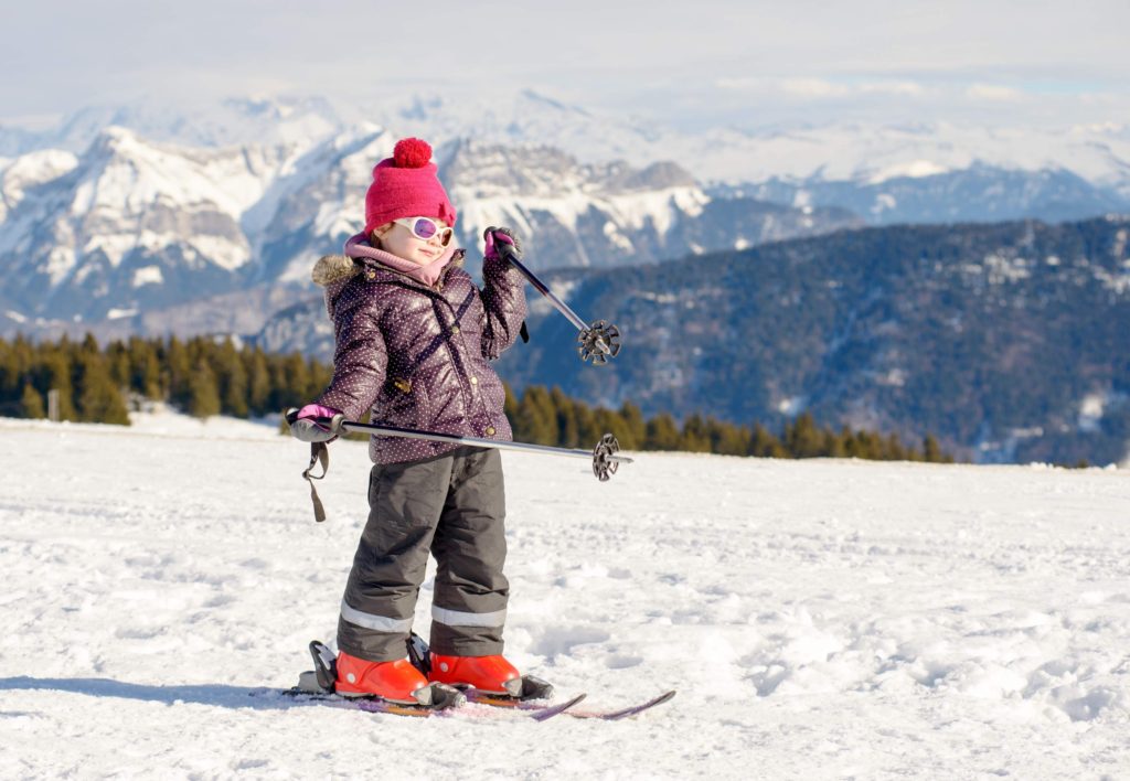 little girl in ski gear